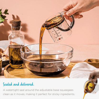 Measuring cup with adjustable base — 1 cup to ¼ cup in one